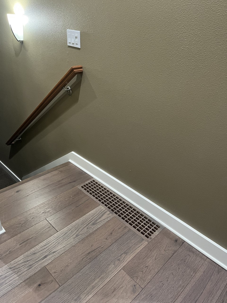 Wood floor vent with a stylish egg crate pattern, designed for durability and a perfect match with wood flooring.
