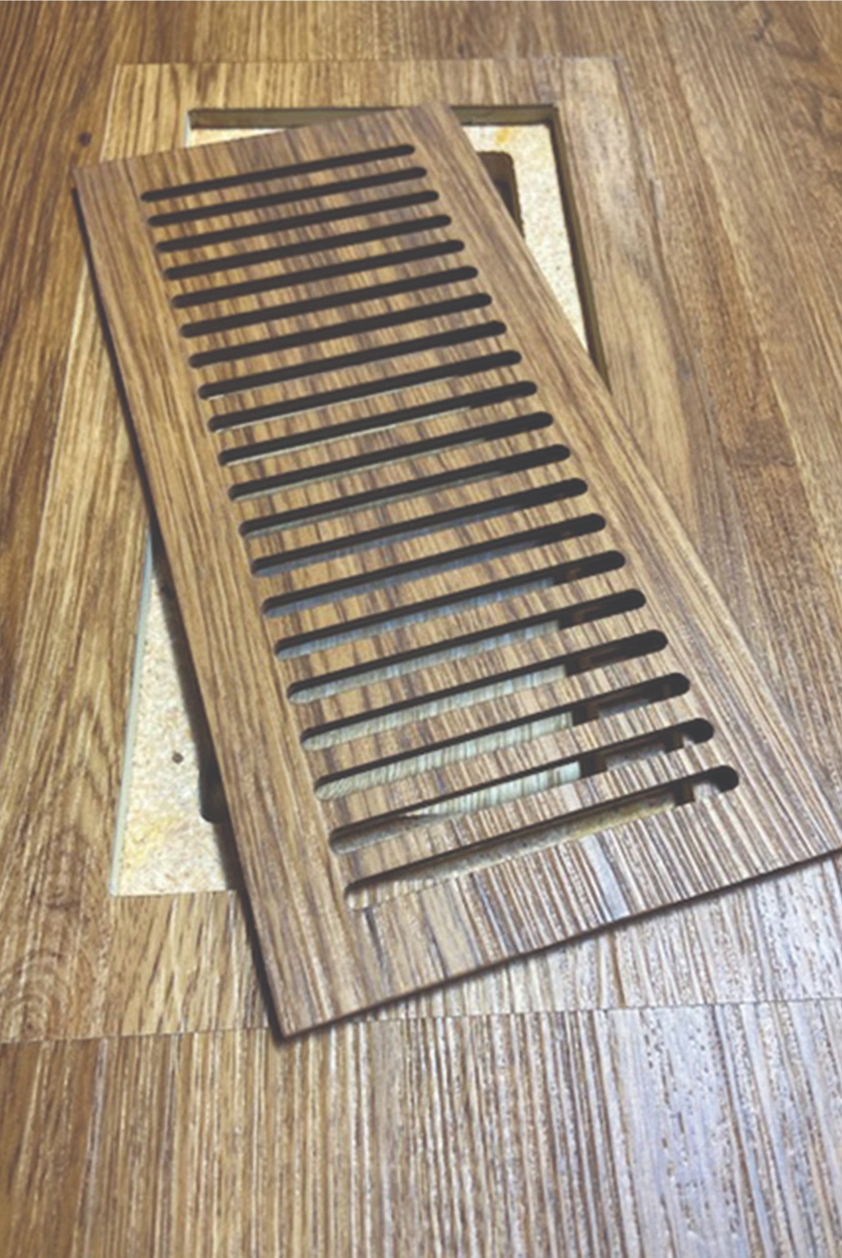 Flush-mount custom floor vent for LVP floors, creating a sleek, modern look while maintaining airflow efficiency in any room.